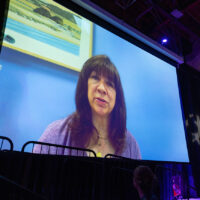 Jana Monaco of Virginia accepting her Community Champion Rare Impact Award via video