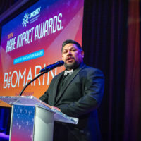 Rigo Garcia of the Hemophilia Foundation of Southern California presenting the Industry Innovation award to BioMarin