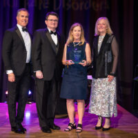 Lorah Perlee of Regeneron with host Peter Alexander, NORD’s Patrick Collins and CEO Pamela Gavin