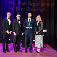 Jérôme de Larosière of Ipsen Biopharmaceuticals with host Peter Alexander, NORD’s Patrick Collins and CEO Pamela Gavin