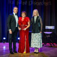 Award winner Darlene Shelton of Danny’s Dose with host Peter Alexander and NORD CEO Pamela Gavin