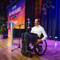 Friedreich’s Ataxia patient Chris Meyer presents Biogen’s Industry Innovation Award