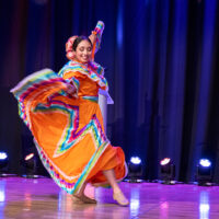 Award winner Abigail Villarreal performs ballet folklórico in a dress with Rare Disease Day colors